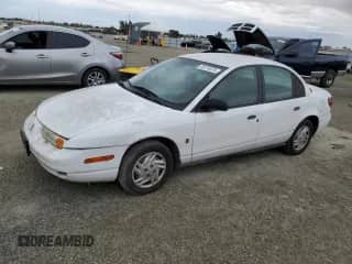 2001 Saturn SL with VIN 1G8ZF52891Z237485, listed as a Copart auction lot 76174574 with 130,525 mi miles and Salvage title. Bid and sale history available at DreamBid. Image 1.