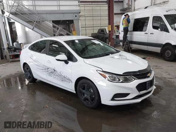✅ 2016 Chevrolet Cruze LS • VIN: 1G1BB5SMXG7272517 • Lot: 41283610. Listed on IAAI with 57,497 mi. Free auction sales archive from the USA and detailed vehicle history report at DreamBid. Image 1.