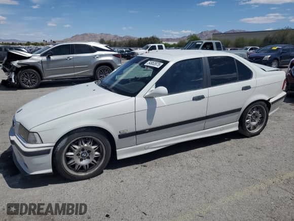1997 BMW 3 Series M3s z VIN WBSCD9326VEE06423, wystawiony jako Copart lot #54953975 z przebiegiem 193 185 mil mil oraz Szkoda całkowita • Salvage title. Historia ofert i sprzedaży dostępna na DreamBid. Obrazek 1.