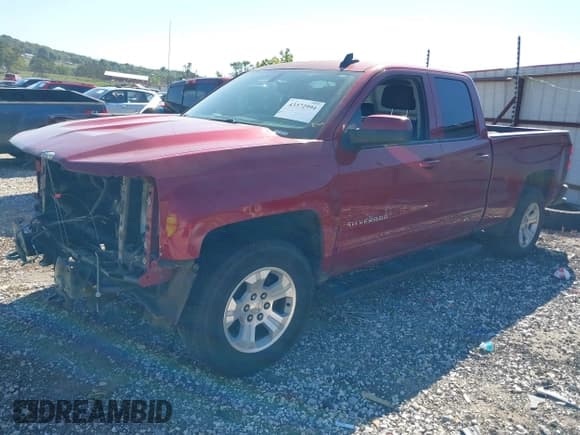 ✅ 2018 Chevrolet Silverado 1500 LT • VIN: 1GCVKREC2JZ216565 • Lot: 43372994. Listed on IAAI with 161,562 mi. Free auction sales archive from the USA and detailed vehicle history report at DreamBid. Image 2.