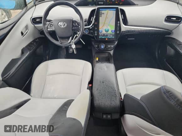 2021 Toyota Prius L Eco with VIN JTDKAMFU6M3145619, listed as a Copart auction lot 60266185 with 43,256 mi miles and Salvage title. Bid and sale history available at DreamBid. Image 8.