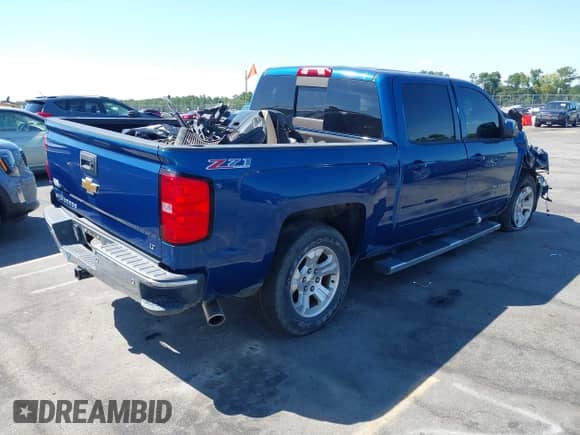 ✅ 2015 Chevrolet Silverado 1500 LT • VIN: 3GCUKREC4FG220751 • Lot: 43128217. Listed on IAAI with 124,000 mi. Free auction sales archive from the USA and detailed vehicle history report at DreamBid. Image 4.