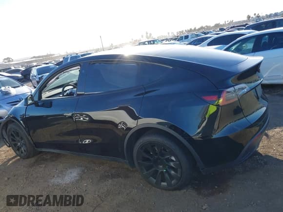 ✅ 2023 Tesla Model Y Long Range • VIN: 7SAYGDEE0PF907260 • Lot: 41180227. Listed on IAAI with Not provided. Free auction sales archive from the USA and detailed vehicle history report at DreamBid. Image 14.