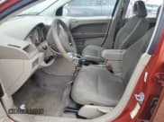 ✅ 2009 Dodge Caliber SXT • VIN: 1B3HB48A99D118492 • Лот: 71394844. Опубликован ранее на Copart с пробегом 137 837 миль. Бесплатный доступ к архиву аукционных продаж из США и подробный отчёт об истории автомобиля на DreamBid. Изображение 7.