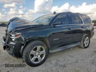 2015 Chevrolet Tahoe LT с VIN 1GNSKBKC5FR595400, выставлен на аукционе Copart как лот 81706635 с пробегом 123 259 миль миль и Списание • Salvage title. История ставок и продаж доступна на DreamBid. Изображение 1.