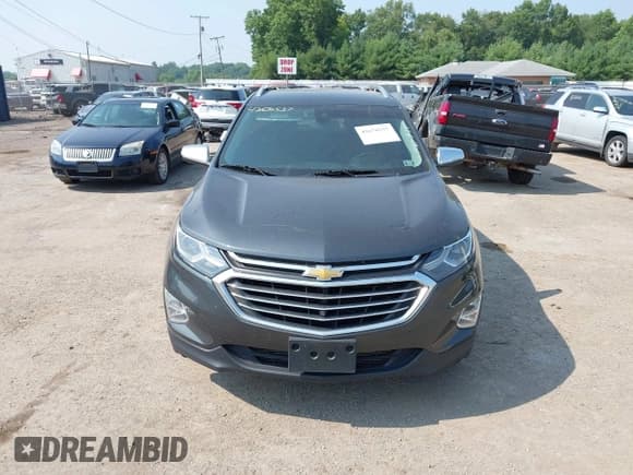 ✅ 2019 Chevrolet Equinox Premier • VIN: 2GNAXNEV4K6184569 • Lot: 42670537. Listed on IAAI with 163,594 mi. Free auction sales archive from the USA and detailed vehicle history report at DreamBid. Image 12.