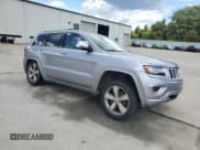 ✅ 2014 Jeep Grand Cherokee Overland • VIN: 1C4RJFCG5EC210163 • Lot: 68894775. Listed on Copart with 205,339 mi. Free auction sales archive from the USA and detailed vehicle history report at DreamBid. Image 4.