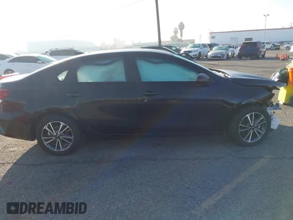 ✅ 2023 Kia Forte LXS • VIN: 3KPF24AD9PE552921 • Lot: 43792222. Listed on IAAI with 28,803 mi. Free auction sales archive from the USA and detailed vehicle history report at DreamBid. Image 13.