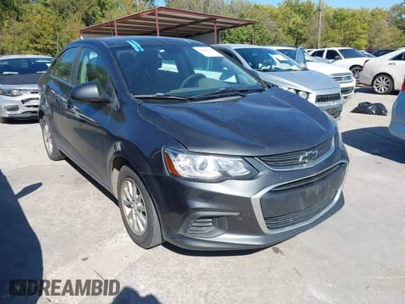 2019 Chevrolet Sonic LT with VIN 1G1JD5SBXK4110059, listed as a IAAI auction lot 43630938 with 87,435 mi miles and . Bid and sale history available at DreamBid. Image 1.