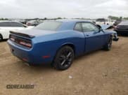 ✅ 2021 Dodge Challenger SXT • VIN: 2C3CDZGG0MH676379 • Lot: 65964614. Wystawiony na Copart z przebiegiem Nie podano. Bezpłatny archiwum sprzedaży aukcyjnych z USA i szczegółowy raport historii pojazdu na DreamBid. Zdjęcie 3.