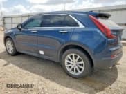 ✅ 2021 Cadillac XT4 FWD Luxury • VIN: 1GYAZAR42MF070201 • Лот: 60850885. Опубликован ранее на Copart с пробегом 53 271 миль. Бесплатный доступ к архиву аукционных продаж из США и подробный отчёт об истории автомобиля на DreamBid. Изображение 2.