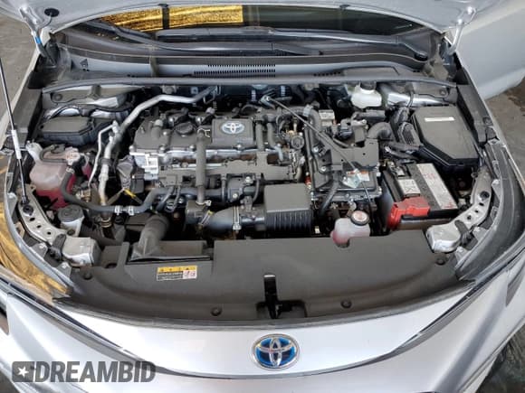 ✅ 2024 Toyota Corolla Hybrid SE • VIN: JTDBCMFE7R3054238 • Лот: 84764035. Опубликован ранее на Copart с пробегом 9 634 миль. Бесплатный доступ к архиву аукционных продаж из США и подробный отчёт об истории автомобиля на DreamBid. Изображение 11.