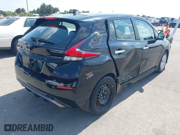 ✅ 2023 Nissan LEAF S • VIN: 1N4AZ1BV1PC557622 • Lot: 42995720. Listed on IAAI with 27,174 mi. Free auction sales archive from the USA and detailed vehicle history report at DreamBid. Image 4.