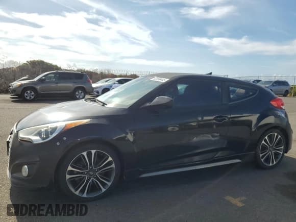 ✅ 2016 Hyundai Veloster Turbo • VIN: KMHTC6AE6GU263562 • Lot: 62899445. Wystawiony na Copart z przebiegiem 88 545 mil. Bezpłatny archiwum sprzedaży aukcyjnych z USA i szczegółowy raport historii pojazdu na DreamBid. Zdjęcie 1.