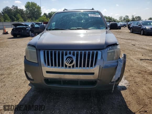 ✅ 2010 Mercury Mariner • VIN: 4M2CN9BG9AKJ17511 • Lot: 63789835. Listed on Copart with 152,609 mi. Free auction sales archive from the USA and detailed vehicle history report at DreamBid. Image 5.