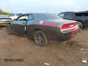 ✅ 2013 Dodge Challenger SXT • VIN: 2C3CDYAG0DH665966 • Lot: 43543054. Listed on IAAI with 128,859 mi. Free auction sales archive from the USA and detailed vehicle history report at DreamBid. Image 3.