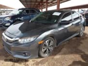 ✅ 2018 Honda Civic EX-T • VIN: JHMFC1F35JX021667 • Lot: 43778970. Listed on IAAI with 159,063 mi. Free auction sales archive from the USA and detailed vehicle history report at DreamBid. Image 2.