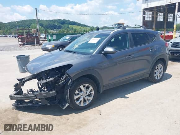 2019 Hyundai Tucson Value with VIN KM8J33A46KU052965, listed as a IAAI auction lot 42662016 with 115,861 mi miles and . Bid and sale history available at DreamBid. Image 2.