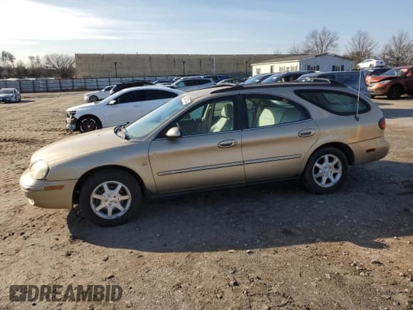 ✅ 2001 Mercury Sable LS Premium • VIN: 1MEHM59S71G644207 • Lot: 84601144. Listed on Copart with 71,236 mi. Free auction sales archive from the USA and detailed vehicle history report at DreamBid. Image 1.