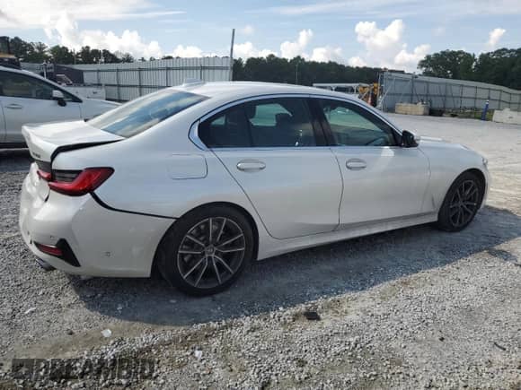 2021 BMW 3 Series 330i with VIN 3MW5R1J04M8B91740, listed as a Copart auction lot 64383555 with 77,484 mi miles and Salvage title. Bid and sale history available at DreamBid. Image 3.