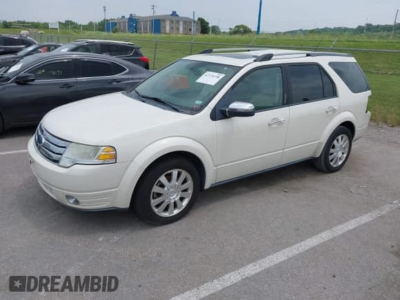✅ 2009 Ford Taurus X Limited • VIN: 1FMDK03W29GA02957 • Lot: 42370198. Listed on IAAI with 196,068 mi. Free auction sales archive from the USA and detailed vehicle history report at DreamBid. Image 2.