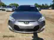 2016 Hyundai Veloster z VIN KMHTC6AD7GU248608, wystawiony jako Copart lot #65809693 z przebiegiem 104 784 mil mil oraz . Historia ofert i sprzedaży dostępna na DreamBid. Obrazek 5.