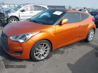 2013 Hyundai Veloster w/Black Int with VIN KMHTC6AD5DU172737, listed as a IAAI auction lot 43608051 with 158,193 mi miles and . Bid and sale history available at DreamBid. Image 2.