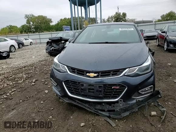 2016 Chevrolet Cruze LT z VIN 1G1BE5SM3G7321080, wystawiony jako Copart lot #82243625 z przebiegiem 90 857 mil mil oraz Szkoda całkowita • Salvage title. Historia ofert i sprzedaży dostępna na DreamBid. Obrazek 13.
