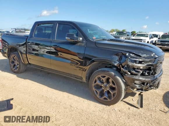 2024 Ram 1500 Limited with VIN 1C6SRFHTXRN153220, listed as a Copart auction lot 61267535 with 22,490 mi miles and Salvage title. Bid and sale history available at DreamBid. Image 4.