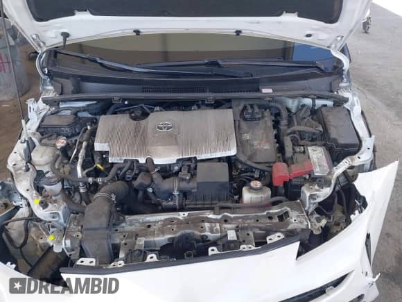 2021 Toyota Prius L Eco with VIN JTDKAMFU4M3134943, listed as a IAAI auction lot 43175713 with 106,611 mi miles and . Bid and sale history available at DreamBid. Image 10.