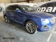 ✅ 2017 Bentley Bentayga W12 • VIN: SJAAC2ZV6HC015247 • Lot: 61849895. Listed on Copart with 46,046 mi. Free auction sales archive from the USA and detailed vehicle history report at DreamBid. Image 4.