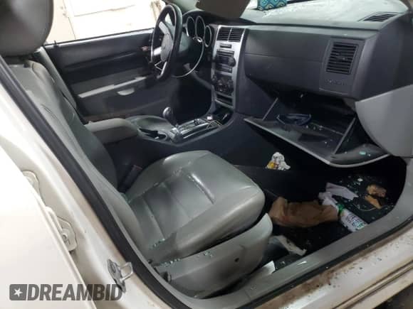 2007 Dodge Magnum с VIN 2D4FV47V57H716776, выставлен на аукционе Copart как лот 41766255 с пробегом Не указан миль и Списание • Salvage title. История ставок и продаж доступна на DreamBid. Изображение 8.