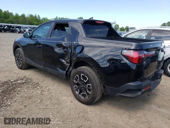 2022 Hyundai Santa Cruz SEL with VIN 5NTJBDAE9NH015673, listed as a Copart auction lot 66458554 with 15,874 mi miles and Salvage title. Bid and sale history available at DreamBid. Image 2.