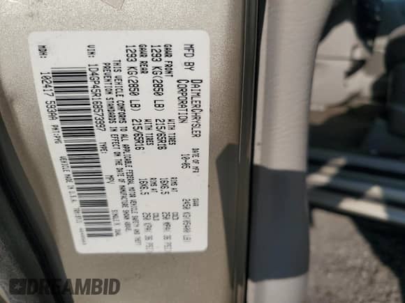 2006 Dodge Caravan SXT z VIN 1D4GP45R16B573997, wystawiony jako Copart lot #69672834 z przebiegiem 82 445 mil mil oraz Szkoda całkowita • Salvage title. Historia ofert i sprzedaży dostępna na DreamBid. Obrazek 13.