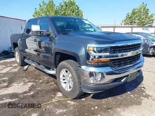 2018 Chevrolet Silverado 1500 LT z VIN 3GCUKREC4JG292008, wystawiony jako IAAI lot #43370209 z przebiegiem 96 545 mil mil oraz . Historia ofert i sprzedaży dostępna na DreamBid. Obrazek 1.