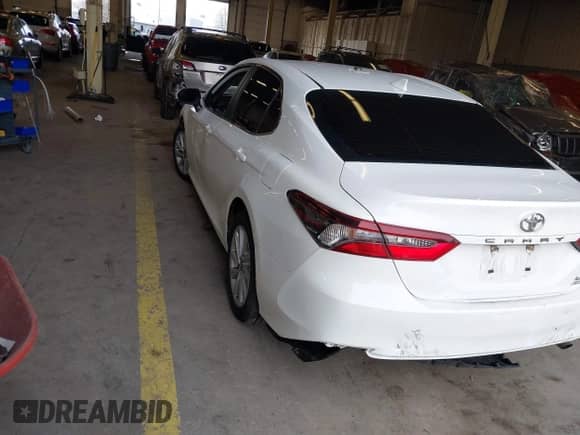 2022 Toyota Camry LE с VIN 4T1C11BK1NU054269, выставлен на аукционе IAAI как лот 41510460 с пробегом 60 997 миль миль и . История ставок и продаж доступна на DreamBid. Изображение 3.