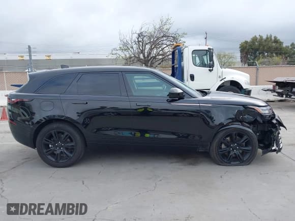 ✅ 2022 Land Rover Range Rover Velar R-Dynamic S • VIN: SALYT2EX7NA334581 • Лот: 41892379. Опубликован ранее на IAAI с пробегом 33 295 миль. Бесплатный доступ к архиву аукционных продаж из США и подробный отчёт об истории автомобиля на DreamBid. Изображение 13.