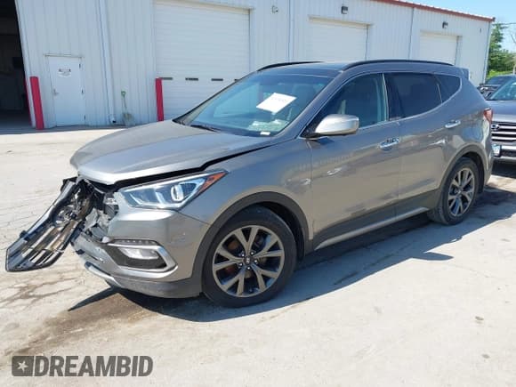 ✅ 2017 Hyundai Santa Fe Ultimate • VIN: 5XYZWDLA0HG424124 • Lot: 42634516. Listed on IAAI with 155,588 mi. Free auction sales archive from the USA and detailed vehicle history report at DreamBid. Image 17.