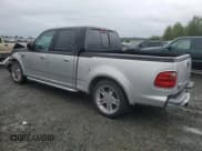 ✅ 2003 Ford F-150 Harley-Davidson • VIN: 1FTRW07363KC24226 • Lot: 67686925. Listed on Copart with 168,393 mi. Free auction sales archive from the USA and detailed vehicle history report at DreamBid. Image 2.