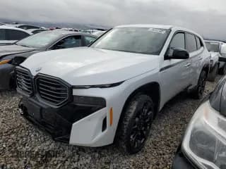 ✅ 2024 BMW XM • VIN: 5YM23CS0XR9V53110 • Лот: 87039014. Опубликован ранее на Copart с пробегом 13 607 миль. Бесплатный доступ к архиву аукционных продаж из США и подробный отчёт об истории автомобиля на DreamBid. Изображение 1.