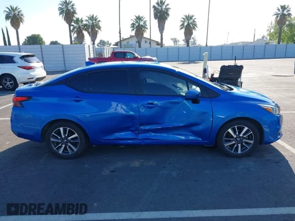 ✅ 2021 Nissan Versa SV • VIN: 3N1CN8EV8ML809002 • Lot: 42143135. Listed on IAAI with 72,020 mi. Free auction sales archive from the USA and detailed vehicle history report at DreamBid. Image 13.