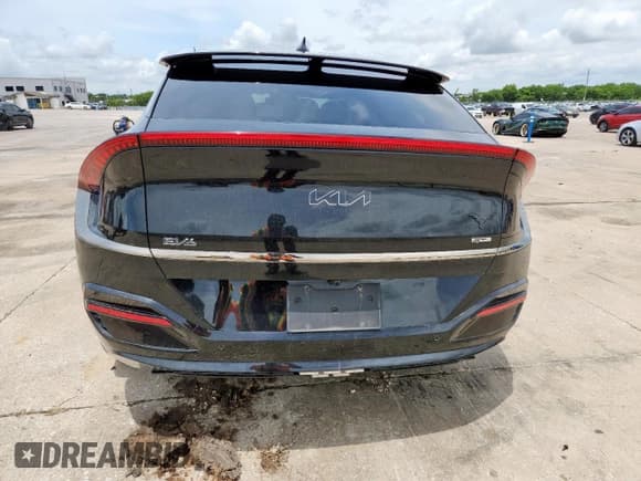 ✅ 2022 Kia EV6 GT-Line • VIN: KNDC44LA9N5052962 • Лот: 60885465. Опубликован ранее на Copart с пробегом 27 532 миль. Бесплатный доступ к архиву аукционных продаж из США и подробный отчёт об истории автомобиля на DreamBid. Изображение 6.