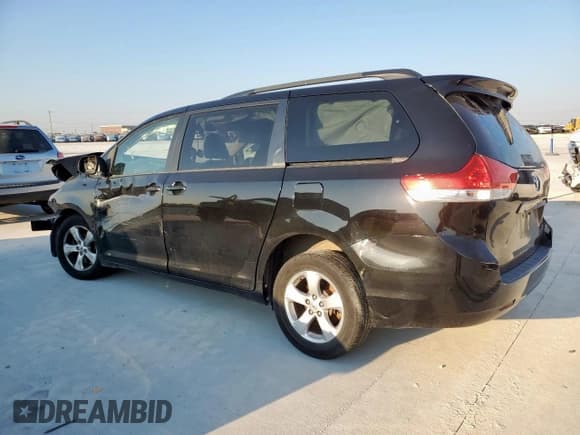 ✅ 2014 Toyota Sienna LE • VIN: 5TDKK3DC7ES452220 • Lot: 84928115. Listed on Copart with 248,727 mi. Free auction sales archive from the USA and detailed vehicle history report at DreamBid. Image 2.