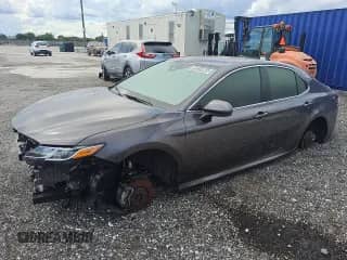 2023 Toyota Camry Hybrid LE with VIN 4T1C31AK3PU608653, listed as a Copart auction lot 59235965 with 57,095 mi miles and Clean title. Bid and sale history available at DreamBid. Image 1.