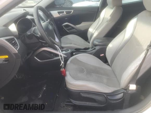 ✅ 2012 Hyundai Veloster w/Gray Int • VIN: KMHTC6AD8CU026685 • Lot: 82612735. Listed on Copart with 148,397 mi. Free auction sales archive from the USA and detailed vehicle history report at DreamBid. Image 7.