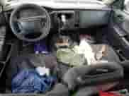 2001 Dodge Dakota Sport с VIN 1B7HG2AZ11S323342, выставлен на аукционе Copart как лот 59001405 с пробегом 245 225 миль миль и Списание • Salvage title. История ставок и продаж доступна на DreamBid. Изображение 8.