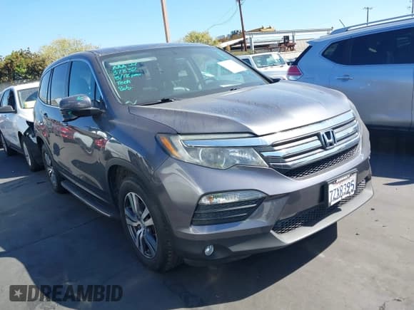 ✅ 2017 Honda Pilot EX-L • VIN: 5FNYF5H59HB030884 • Lot: 43118488. Listed on IAAI with 69,489 mi. Free auction sales archive from the USA and detailed vehicle history report at DreamBid. Image 1.