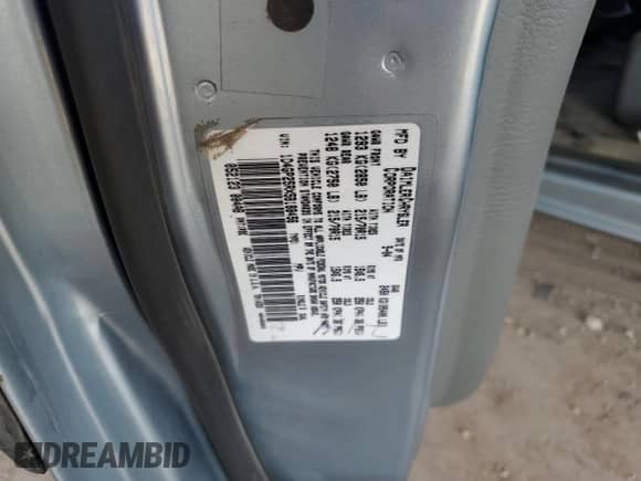 2005 Dodge Caravan SE with VIN 1D4GP25RX5B188456, listed as a Copart auction lot 73244094 with 104,199 mi miles and Salvage title. Bid and sale history available at DreamBid. Image 13.