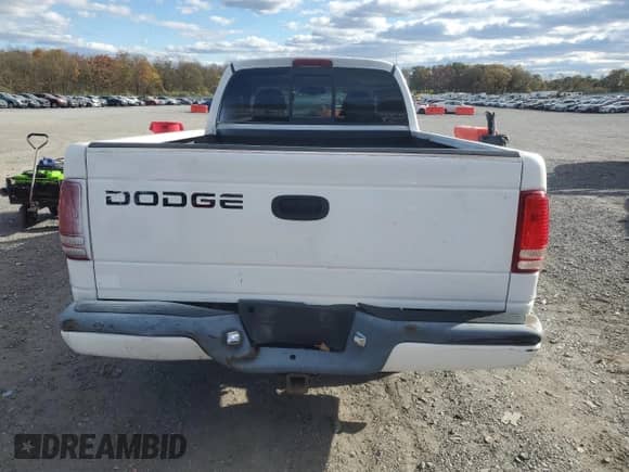 2001 Dodge Dakota z VIN 1B7GL22X21S162973, wystawiony jako Copart lot #76419754 z przebiegiem 135 707 mil mil oraz Czysty tytuł • Clean title. Historia ofert i sprzedaży dostępna na DreamBid. Obrazek 6.