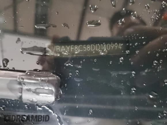 ✅ 2013 BMW 7 Series 750Li xDrive • VIN: WBAYF8C58DD140994 • Lot: 84940475. Wystawiony na Copart z przebiegiem 86 192 mil. Bezpłatny archiwum sprzedaży aukcyjnych z USA i szczegółowy raport historii pojazdu na DreamBid. Zdjęcie 13.